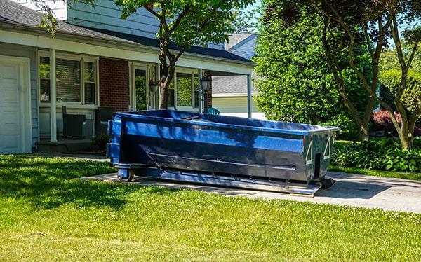 residential dumpsters can be placed on a driveway or lawn, but preventative measures must be taken to avoid damage to the property